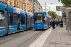 Catching the streetcar in downtown Stockholm.